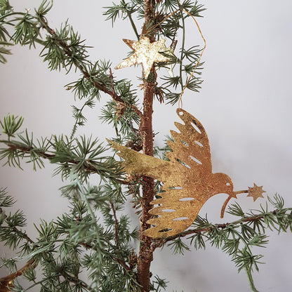 Gouden vogel met sterren